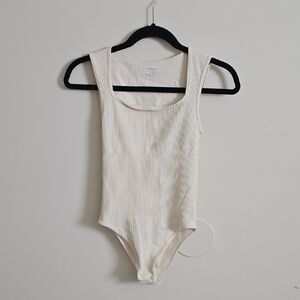Elegant Cream Ribbed Bodysuit